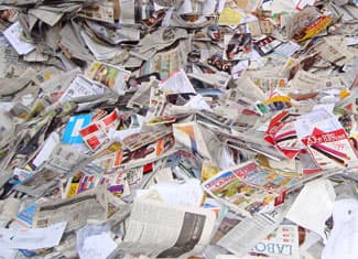 Large pile of discarded junk mail and advertising